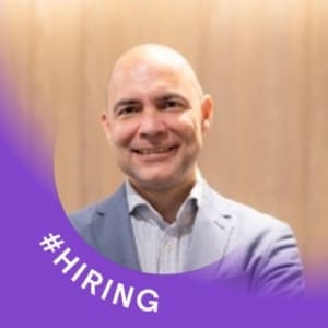 Man posing with caption "#Hiring"