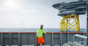 A Taylor Hopkinson offshore wind specialist onboard a vessel at an offshore wind farm.