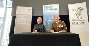 Donna Ellcock, Managing Director, Offshore Wind Contract at Taylor Hopkinson, signs the Armed Forces Covenant alongside Lieutenant General Richard Wardlaw.